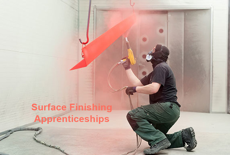 Man spray painting object wearing PPE.