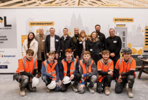 Young construction students pictured with tutors and stakeholders