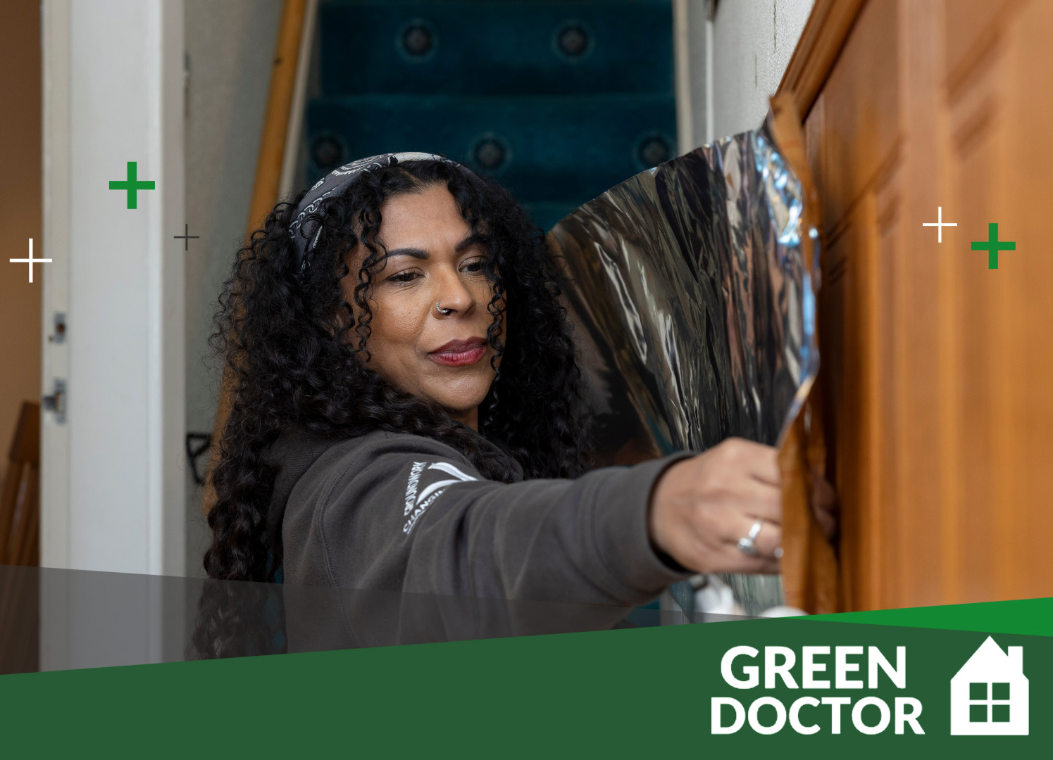 Image of female undertaking eco improvement work in a home