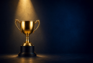 EMPLOYERS: GET YOUR APPRENTICESHIP COMMITMENT RECOGNISED Image of gold trophy on dark blue background