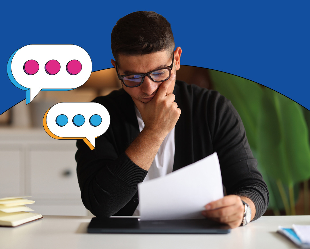 Image of male reading documents with graphical thought bubbles