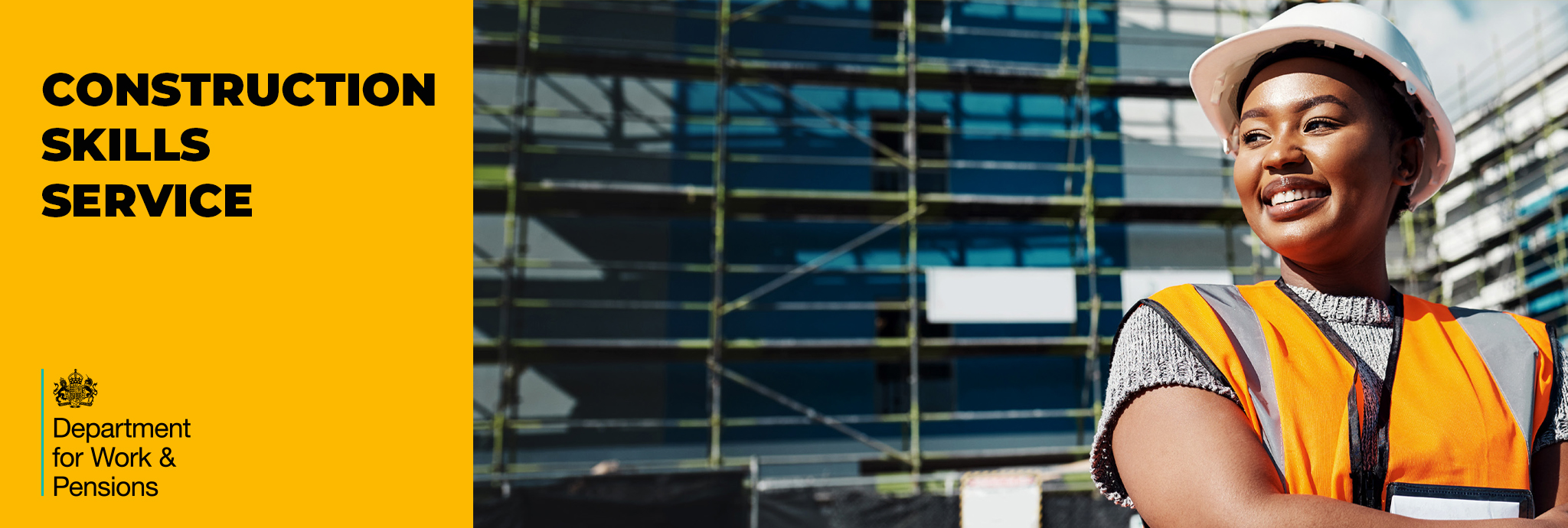 IMAGE OF BLACK FEMALE CONSTRUCTION WORKER ON ACTIVE BUILDING SITE