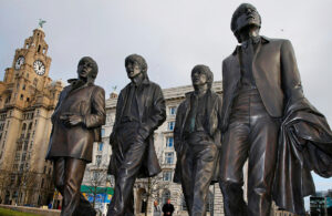 Image of Beatles bronze statues pictured next to Liver Building